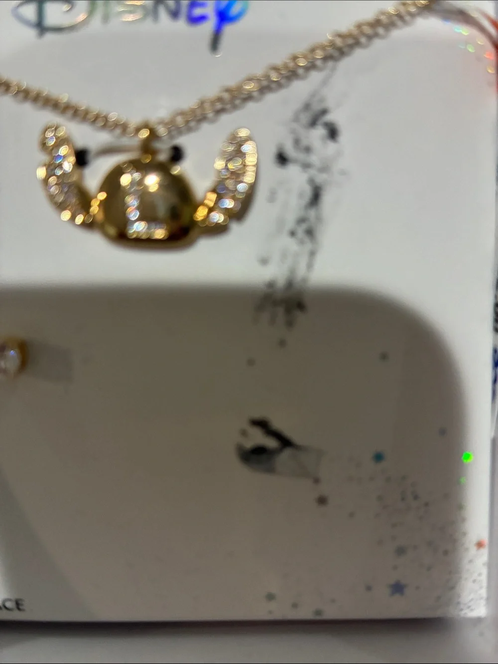 Disney gold tone